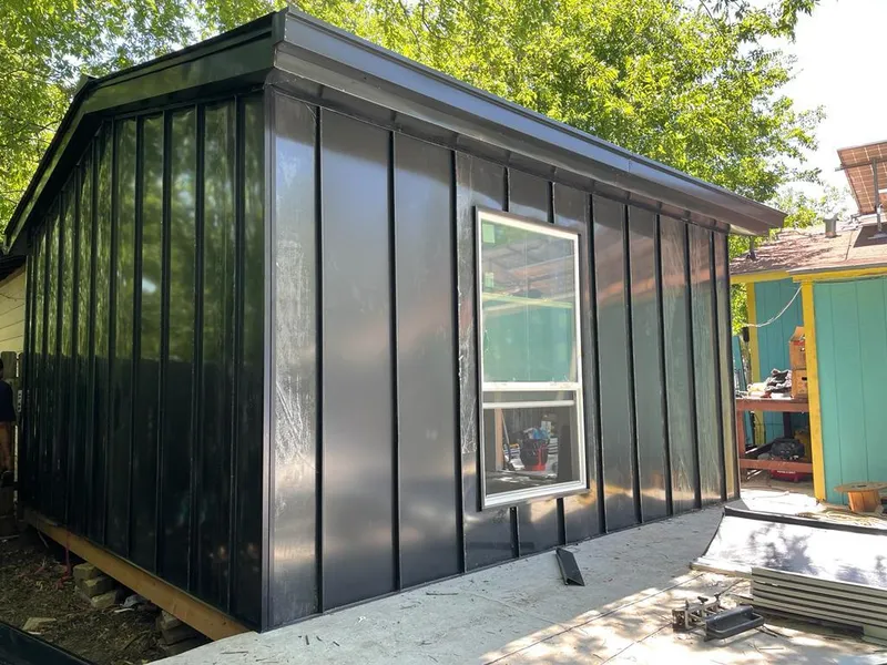 Black standing seam metal wall panels for Metal Roof Installation in Bergenfield