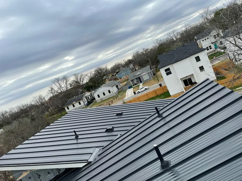 Standing seam metal roof panels with vents for Skylight Repair in Bergenfield